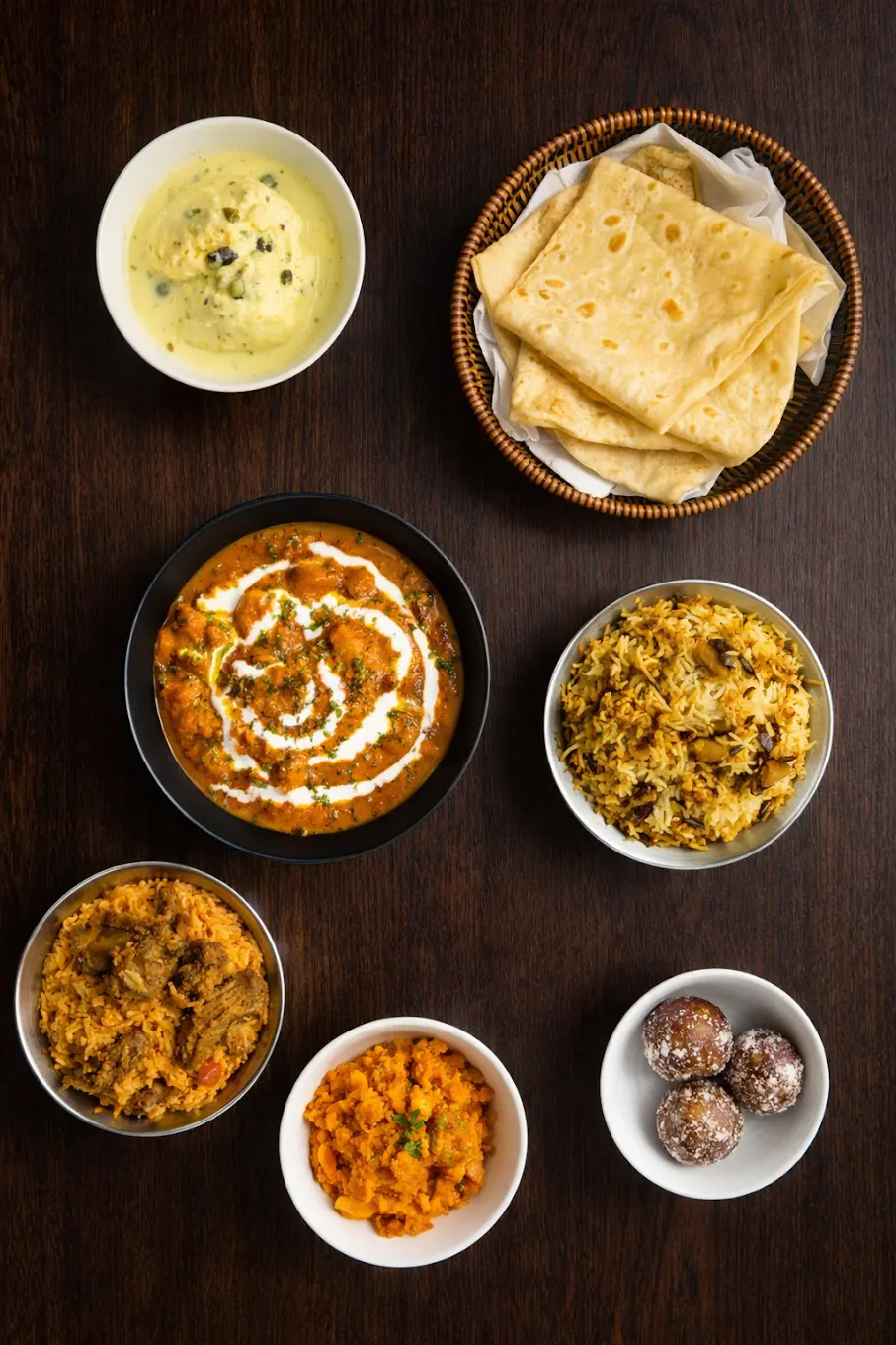 A table filled with āhāra dishes